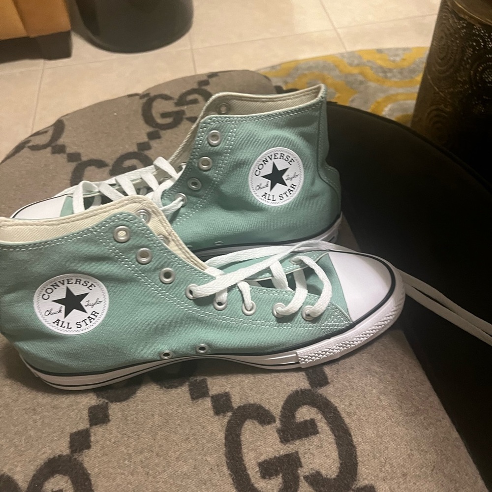 Rare converse high top in mint green.  Womens 11.5 or men’s 9.5. New with box .